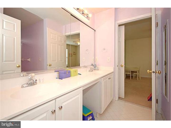 3 Sandstone Road East Windsor, NJ 08520 - Photo 19 of 24 a en suite bathroom with a sink and a mirror
