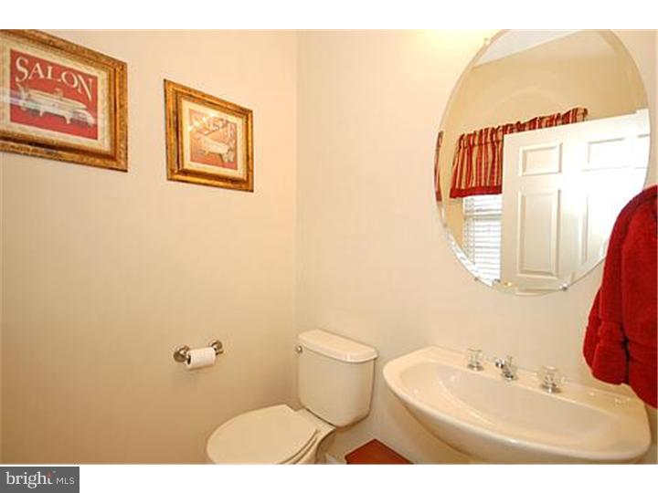3 Sandstone Road East Windsor, NJ 08520 - Photo 23 of 24 a bathroom with a sink and a mirror