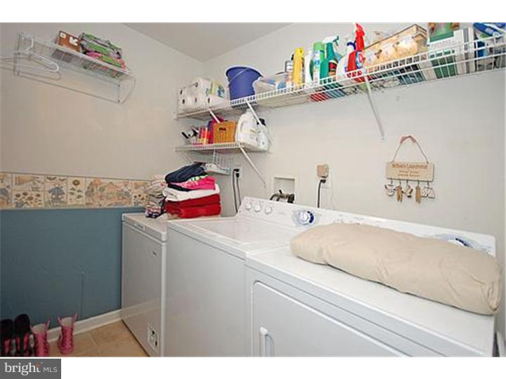 3 Sandstone Road East Windsor, NJ 08520 - Photo 24 of 24 a utility room with sink dryer and washer