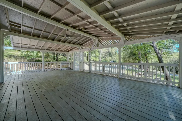 a view of outdoor space with wooden deck