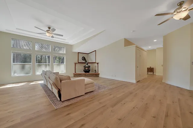 a living room with furniture and a table