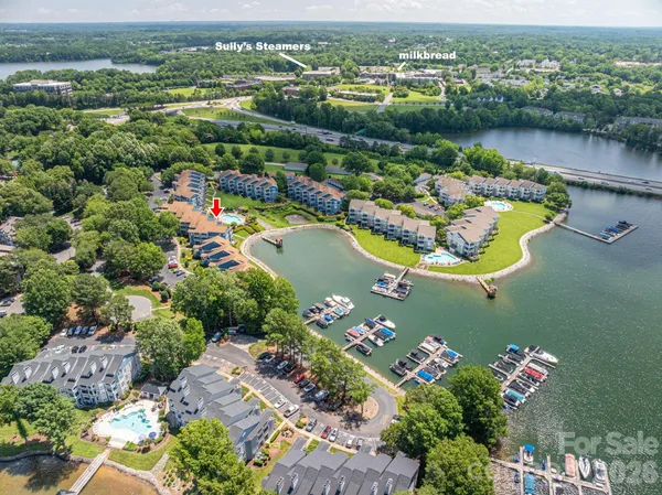 an aerial view of lake residential house with outdoor space