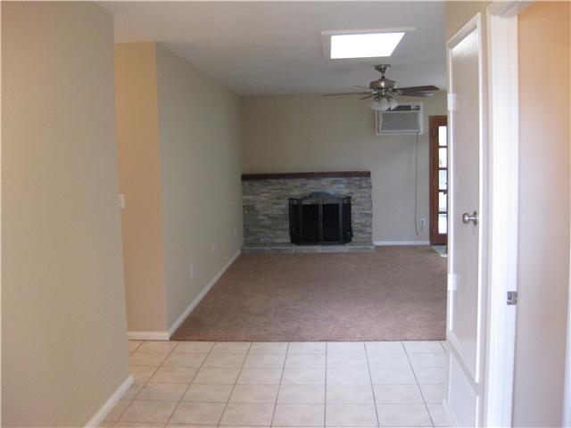 8527 Langholm Road El Cajon, CA 92021 - Photo 4 of 18 View of entry and living room from front door. Note the skylight, air conditioner and fan. You won't be Hot in this this home!