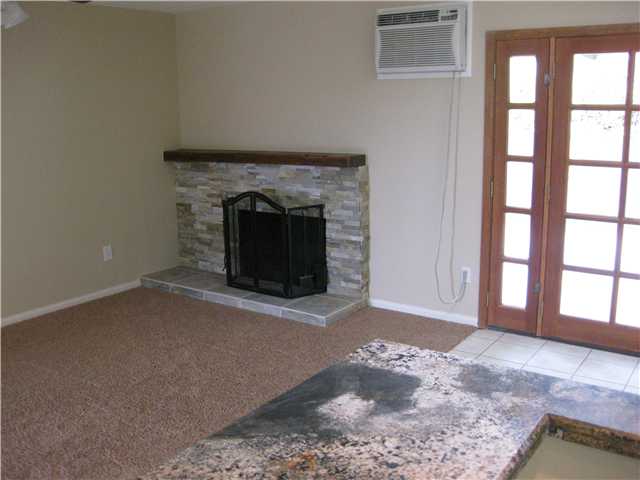 8527 Langholm Road El Cajon, CA 92021 - Photo 5 of 18 Livinng room with fireplace, new stone!