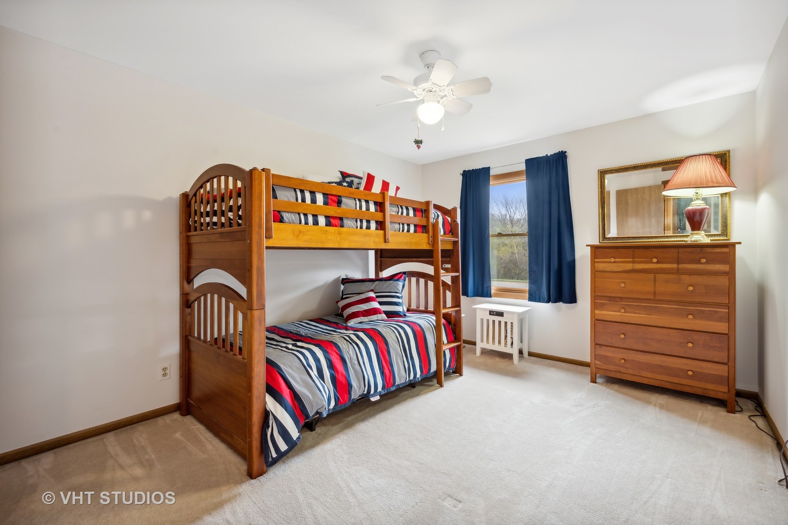 1402 Cherry Drive Batavia, IL 60510 - Photo 11 of 22 a bedroom with a bed and a dresser