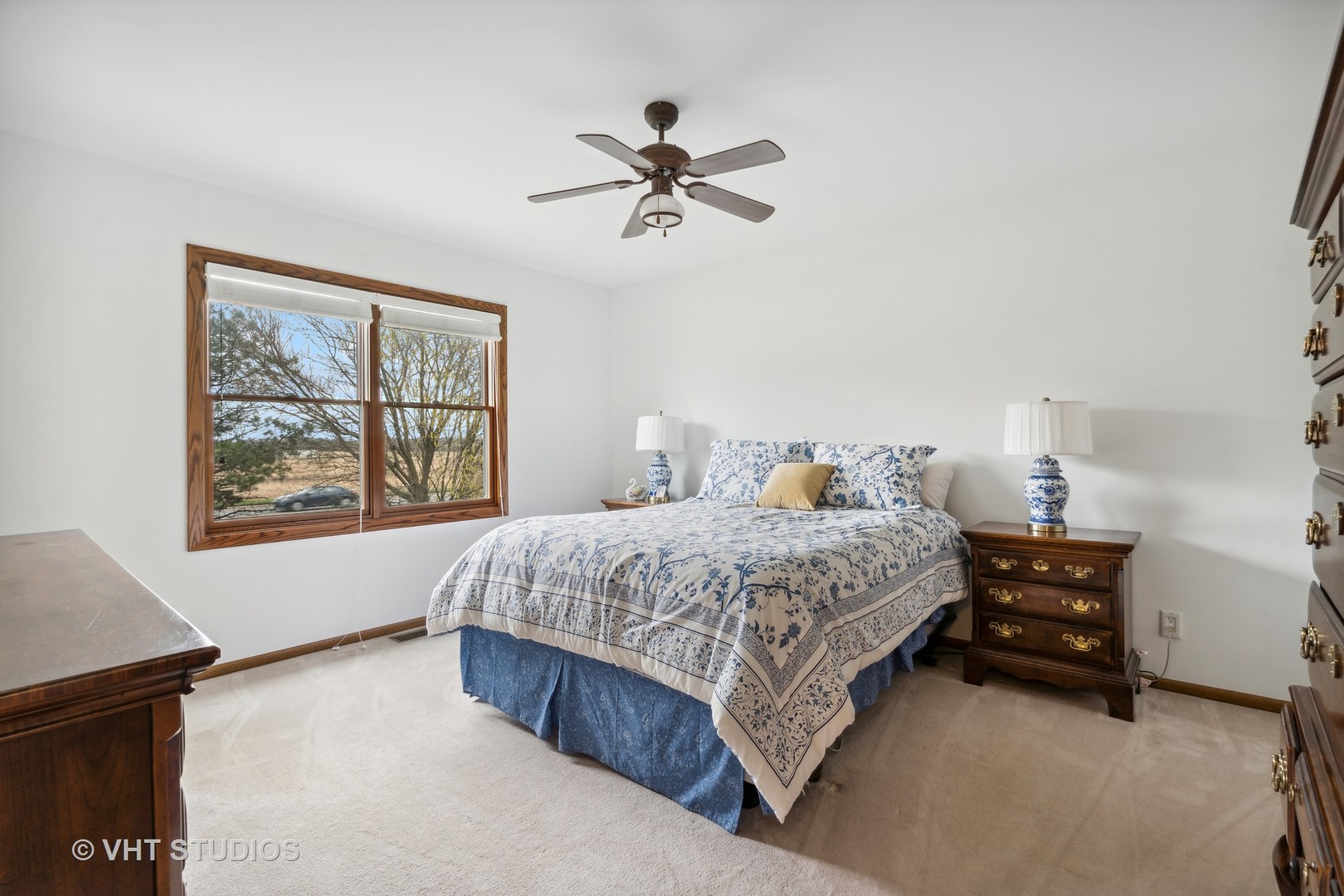 1402 Cherry Drive Batavia, IL 60510 - Photo 14 of 22 a spacious bedroom with a bed and a window