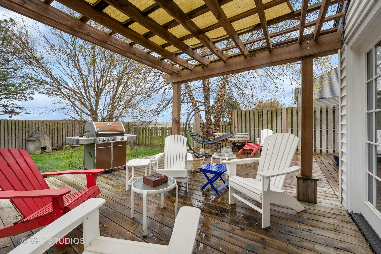 1402 Cherry Drive Batavia, IL 60510 - Photo 16 of 22 a view of a patio with couches chairs and wooden floor