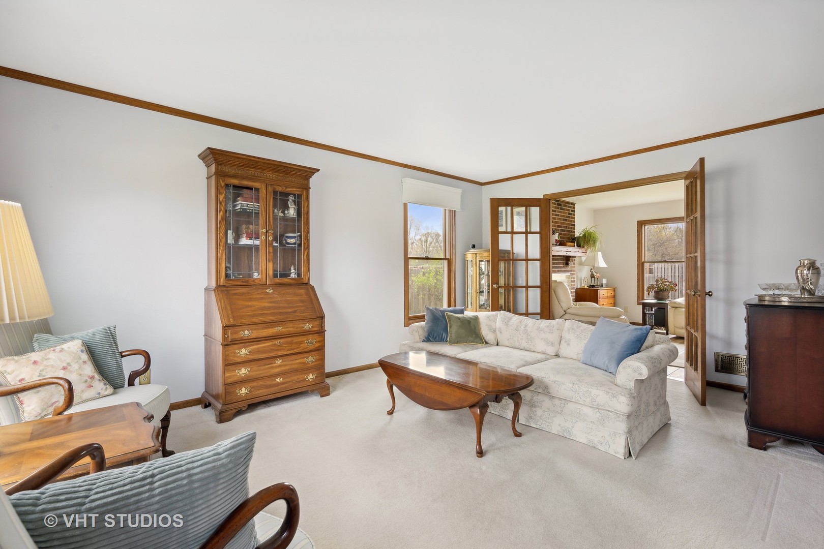 1402 Cherry Drive Batavia, IL 60510 - Photo 3 of 22 a living room with furniture a rug and a window
