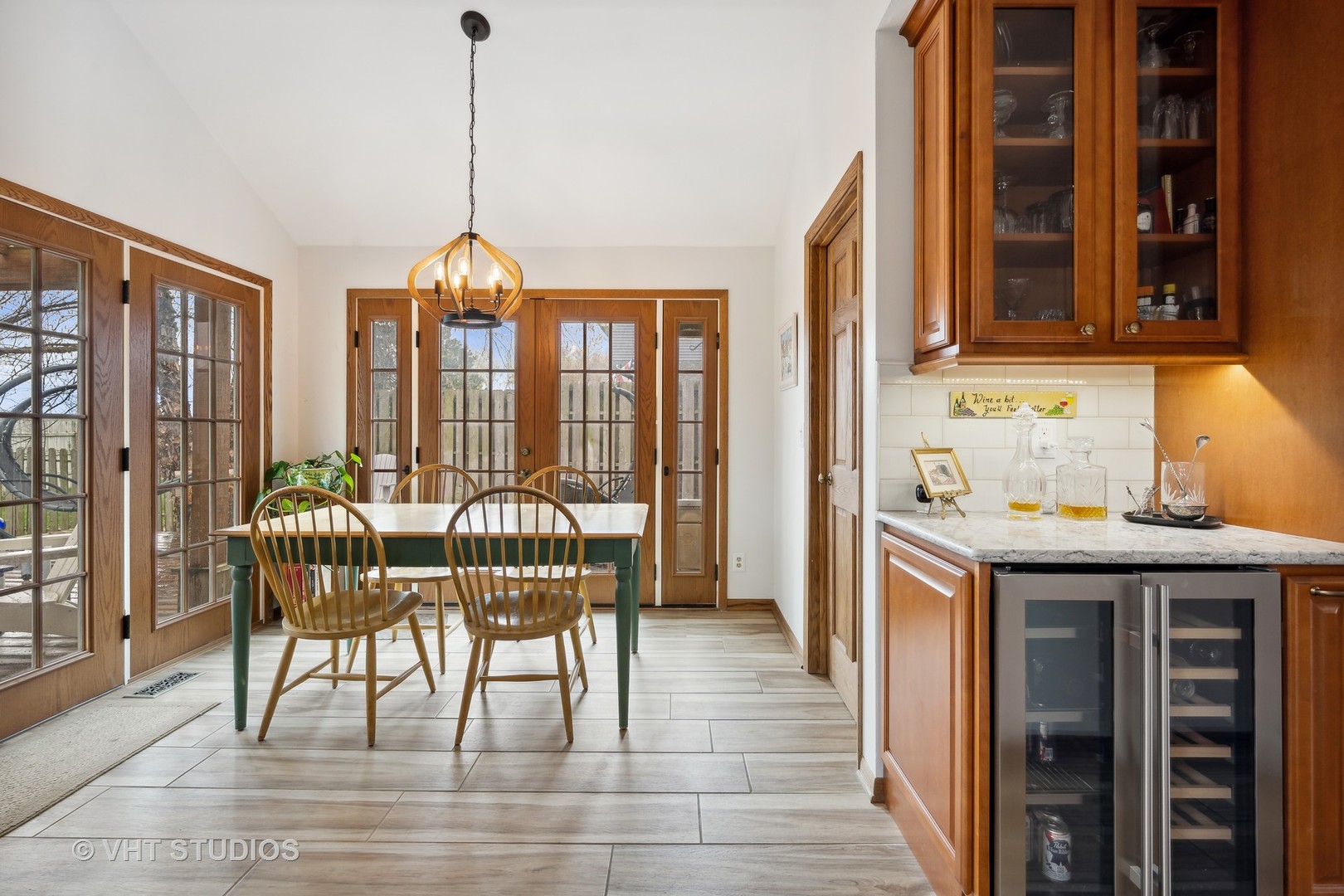 1402 Cherry Drive Batavia, IL 60510 - Photo 8 of 22 a dining room with furniture and window