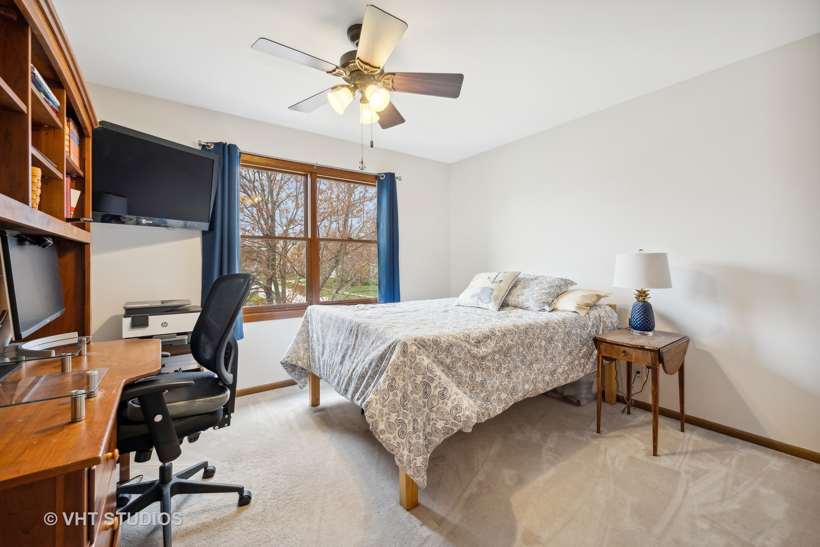 1402 Cherry Drive Batavia, IL 60510 - Photo 10 of 22 a bedroom with a bed a chair and a chandelier