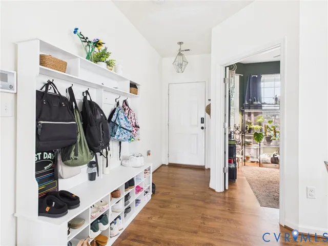 a view of an entryway and livingroom with furniture