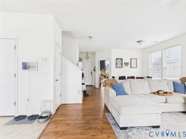 a living room with furniture and a table