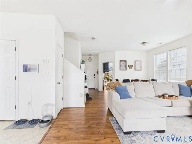 a living room with furniture and a table
