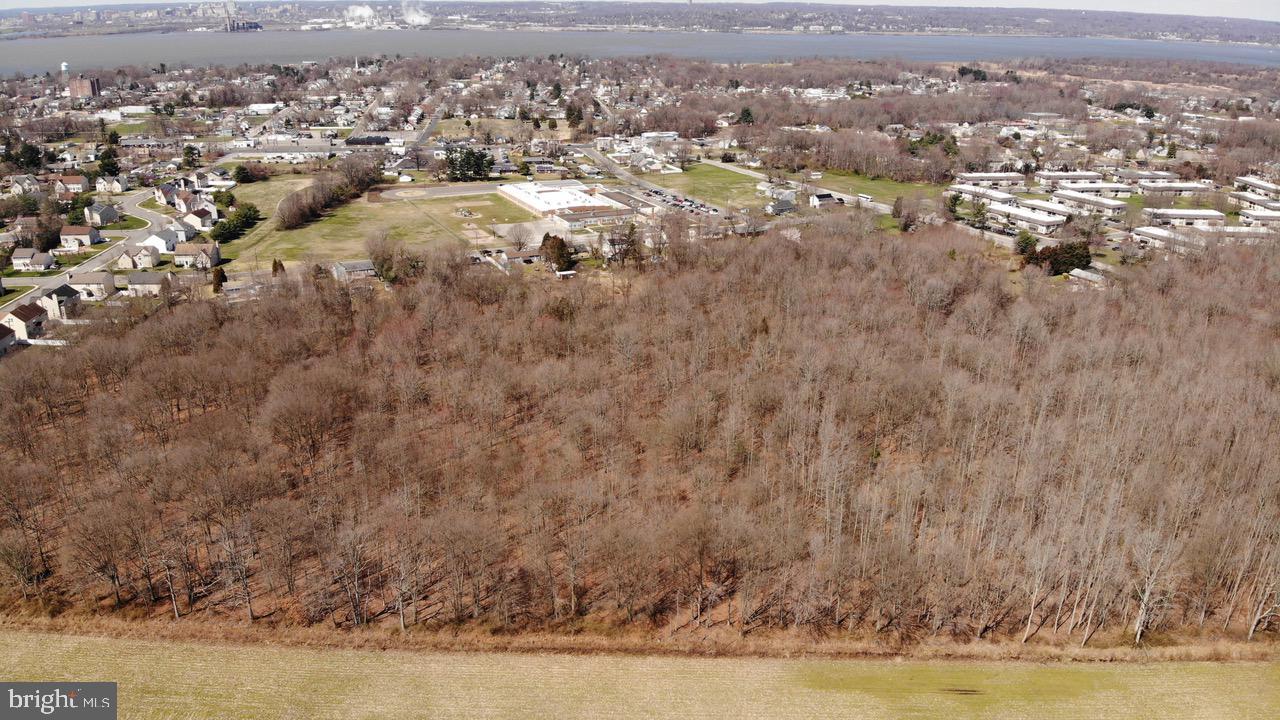 210 Penns Grove Auburn Road Penns Grove, NJ 08069 - Photo 2 of 17 an aerial view of house with yard