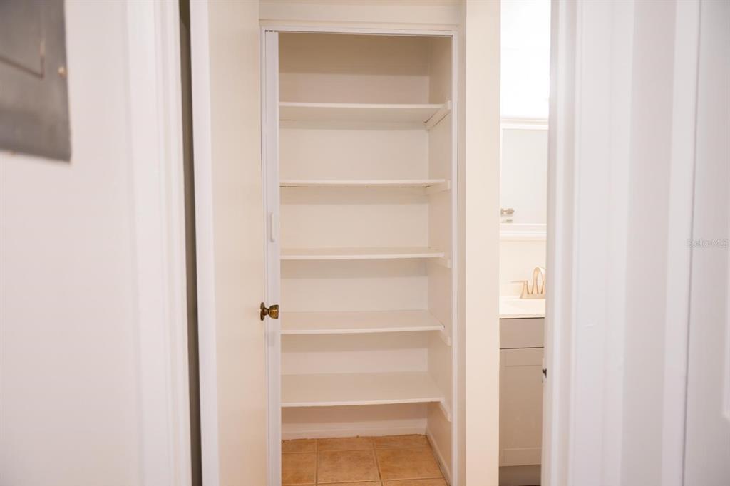 1902 Honour Road, Unit 23 Orlando, FL 32839 - Photo 21 of 31 a view of walk in closet with empty racks