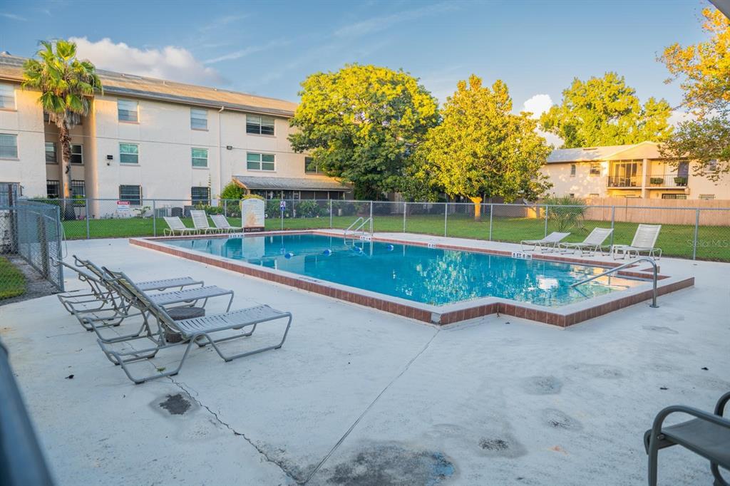 1902 Honour Road, Unit 23 Orlando, FL 32839 - Photo 28 of 31 swimming pool view with a outdoor seating