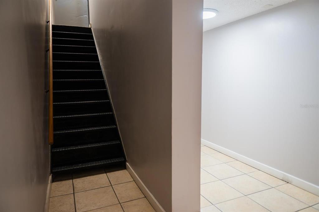 1902 Honour Road, Unit 23 Orlando, FL 32839 - Photo 8 of 31 a view of a hallway