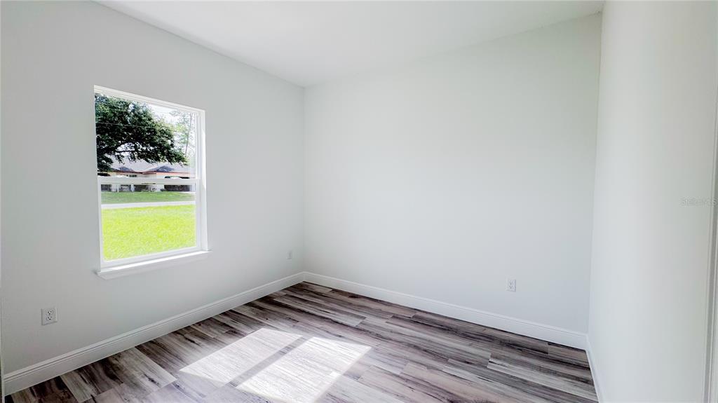 15625 Southwest 37th Circle Ocala, FL 34473 - Photo 13 of 27 a view of an empty room and a window
