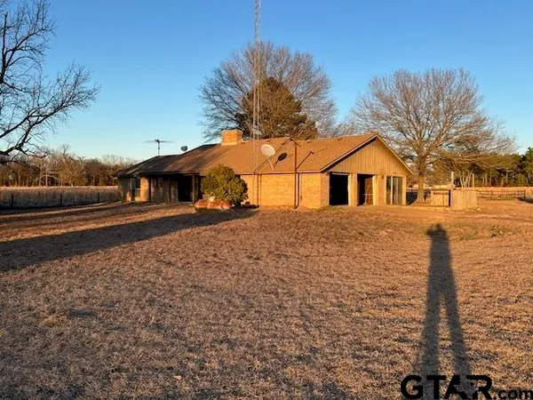 a view of house with outdoor space