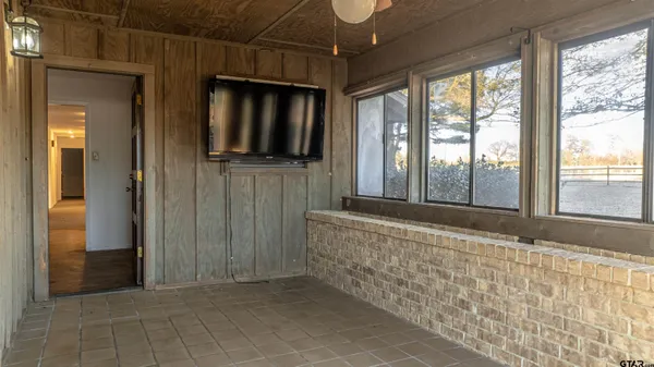 a view of a backyard of the house