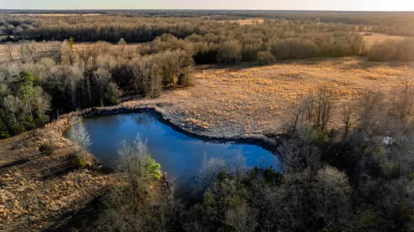 an aerial view of residential houses with ocean view