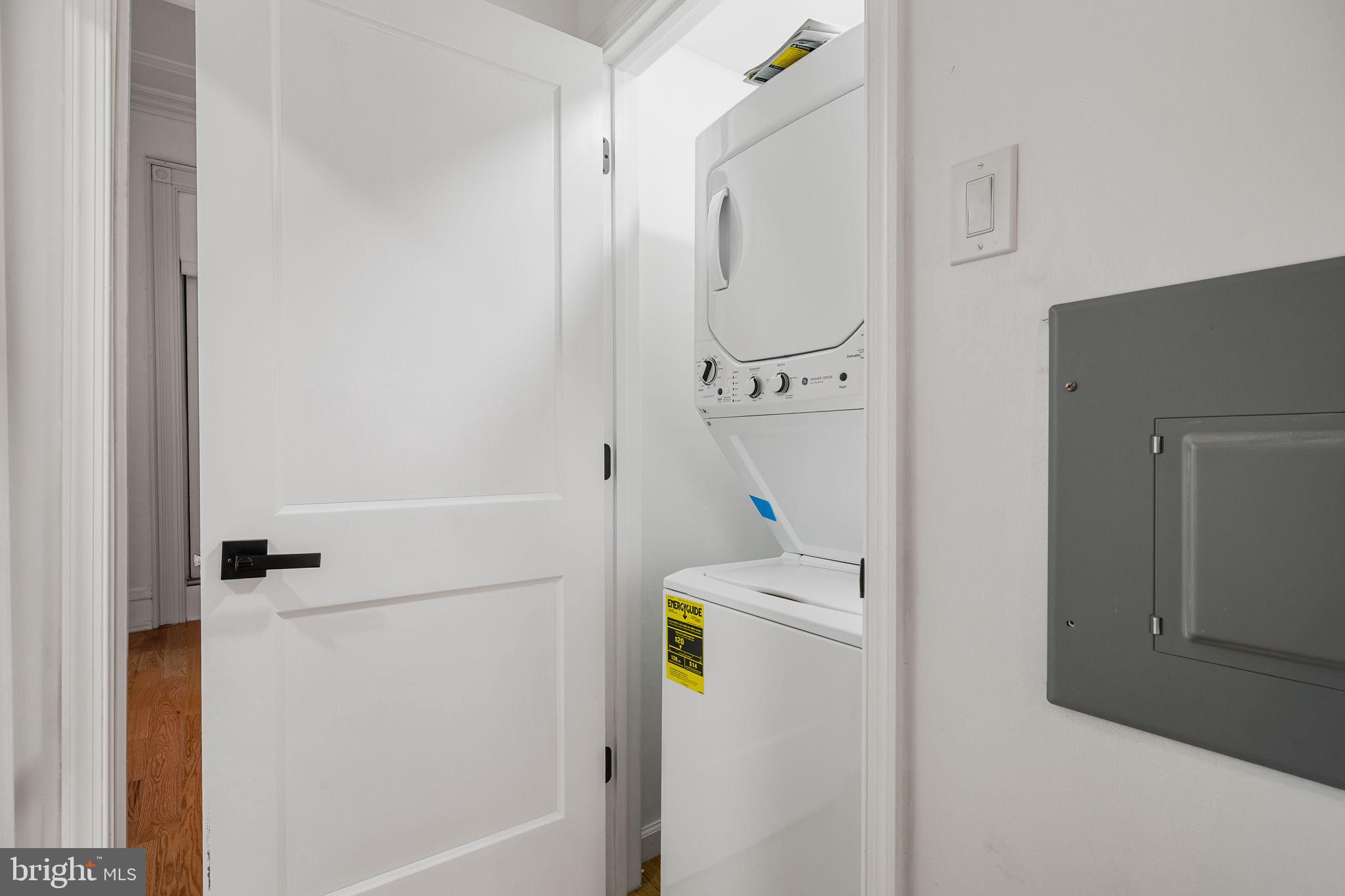 1225 Spruce Street, Unit 1F Philadelphia, PA 19107 - Photo 17 of 21 a utility room with dryer and washer