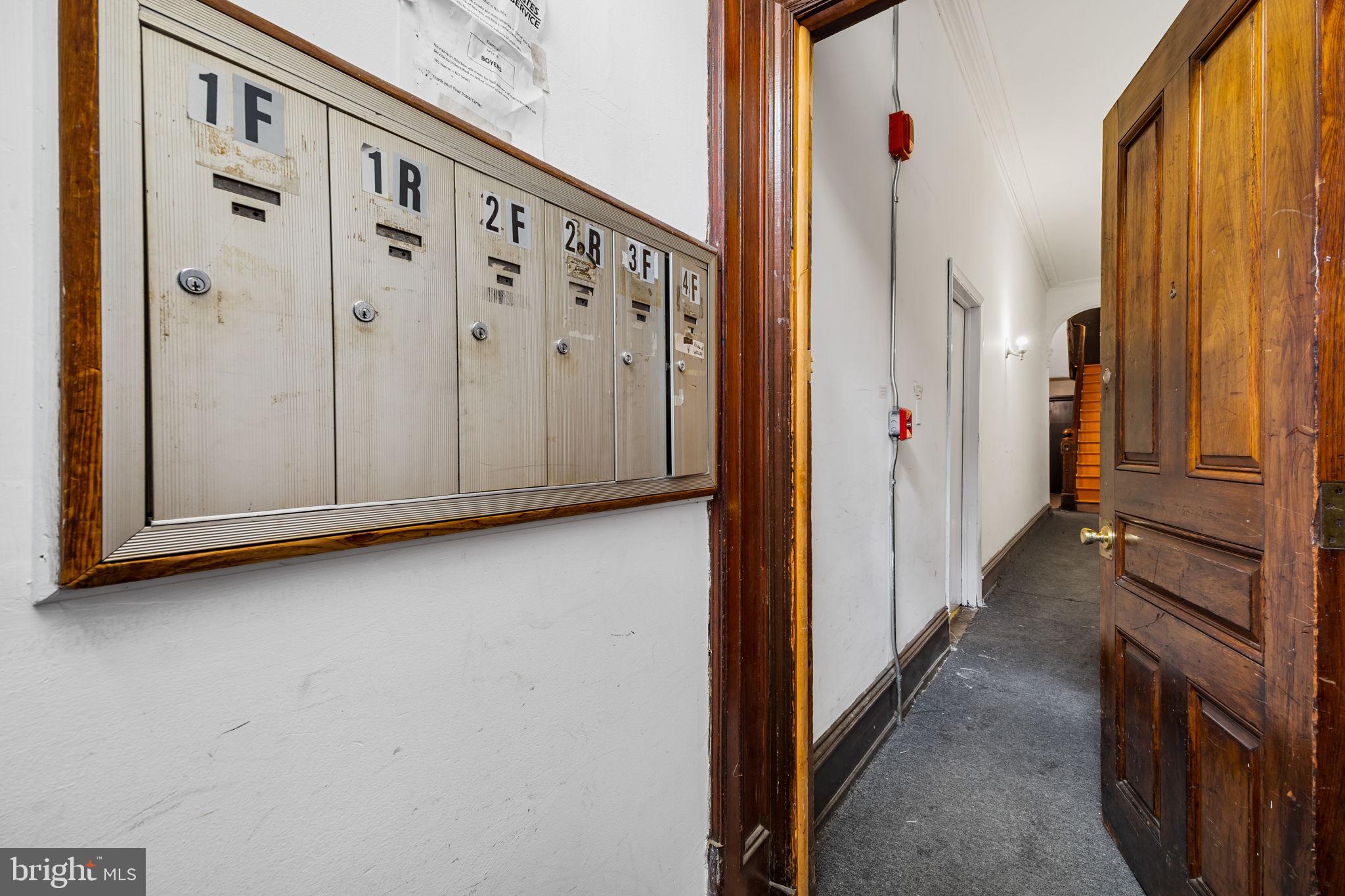 1225 Spruce Street, Unit 1F Philadelphia, PA 19107 - Photo 20 of 21 a view of a entryway with wooden walls
