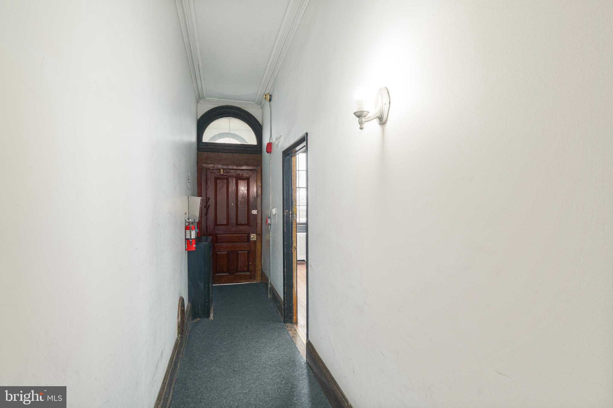 1225 Spruce Street, Unit 1F Philadelphia, PA 19107 - Photo 4 of 21 a view of a livingroom with furniture