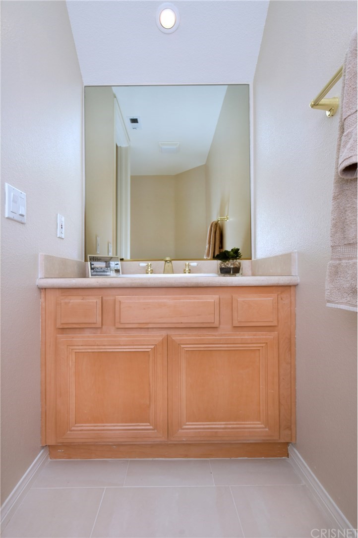 3619 Cll Joaquin Calabasas, CA 91302 - Photo 27 of 42 a bathroom with a sink and a mirror