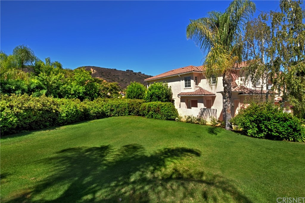 3619 Cll Joaquin Calabasas, CA 91302 - Photo 40 of 42 a front view of a house with a garden