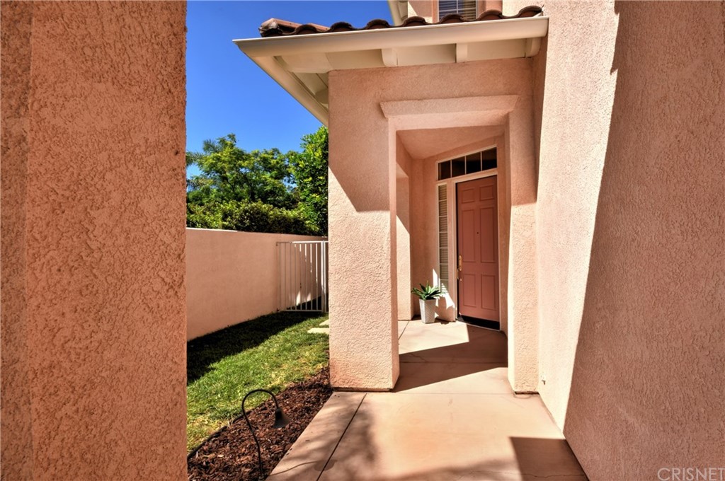 3619 Cll Joaquin Calabasas, CA 91302 - Photo 5 of 42 a front view of a house with a yard