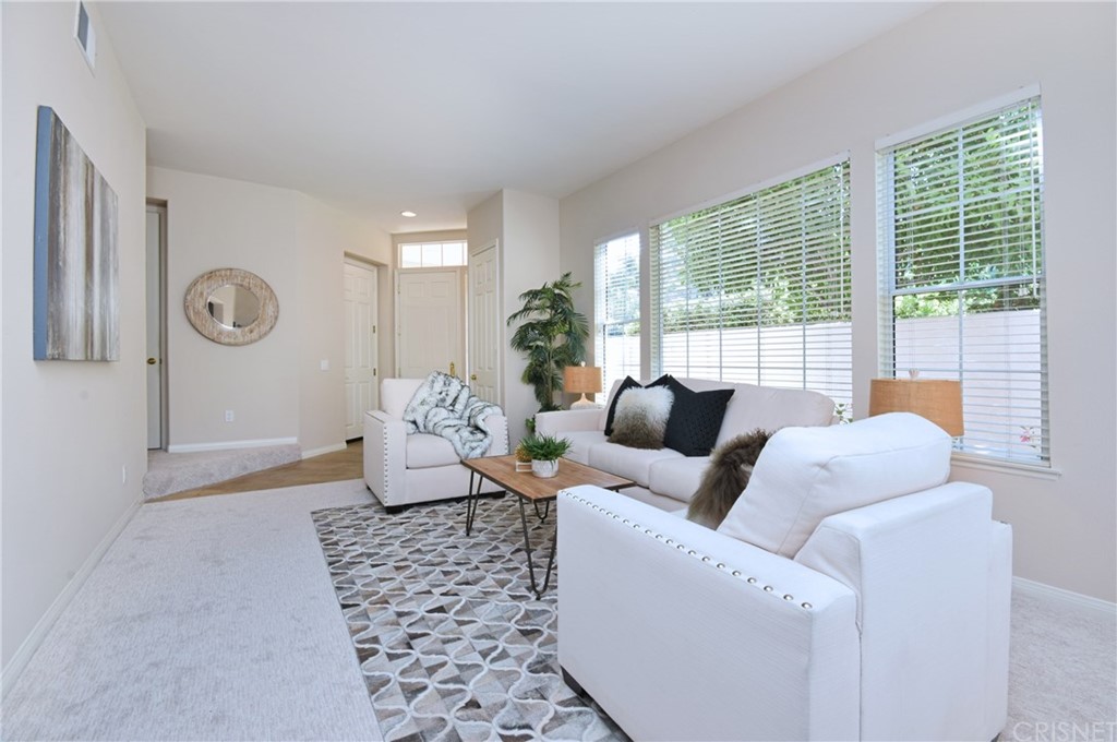 3619 Cll Joaquin Calabasas, CA 91302 - Photo 8 of 42 a living room with furniture and a large window