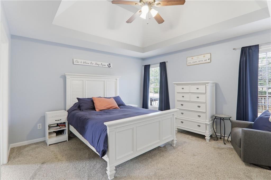 23 Crestview Terrace Dallas, GA 30157 - Photo 19 of 36 a bedroom with a bed and a dresser