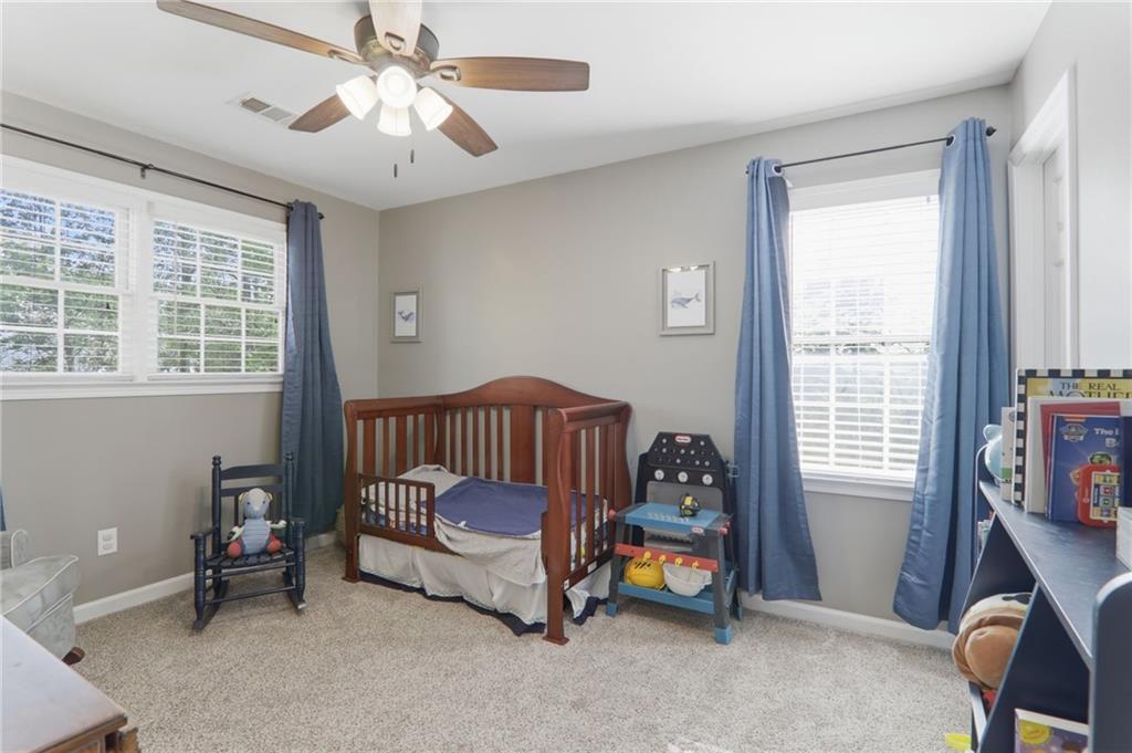 23 Crestview Terrace Dallas, GA 30157 - Photo 24 of 36 a bedroom with furniture and a window