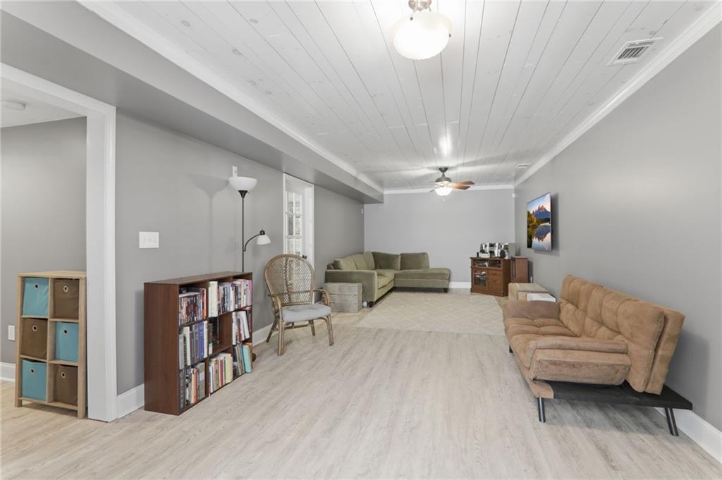 23 Crestview Terrace Dallas, GA 30157 - Photo 28 of 36 a living room with furniture and a book shelf