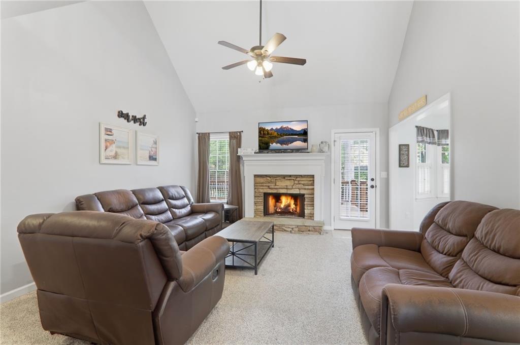23 Crestview Terrace Dallas, GA 30157 - Photo 6 of 36 a living room with furniture and a fireplace