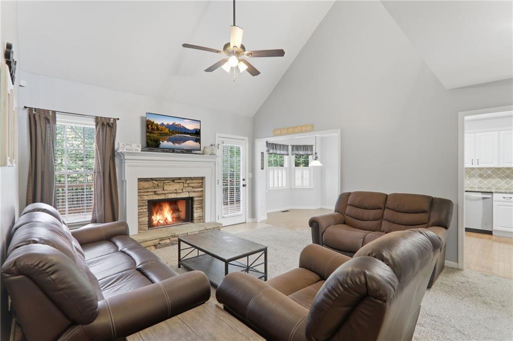 23 Crestview Terrace Dallas, GA 30157 - Photo 8 of 36 a living room with furniture and a fireplace