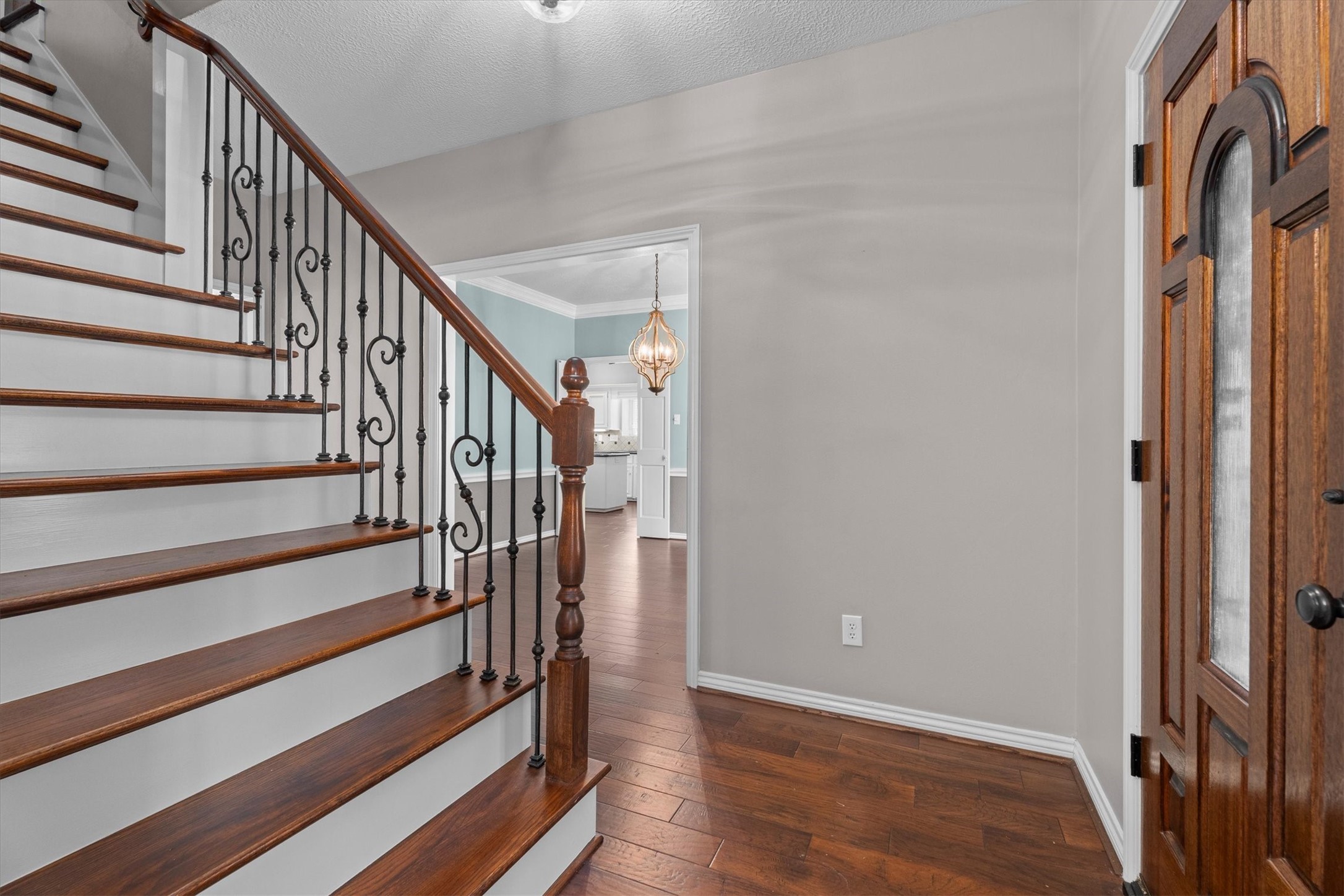 16267 Salmon Lane Spring, TX 77379 - Photo 6 of 48 The staircase has also been updated with wood floors and wrought iron balusters.