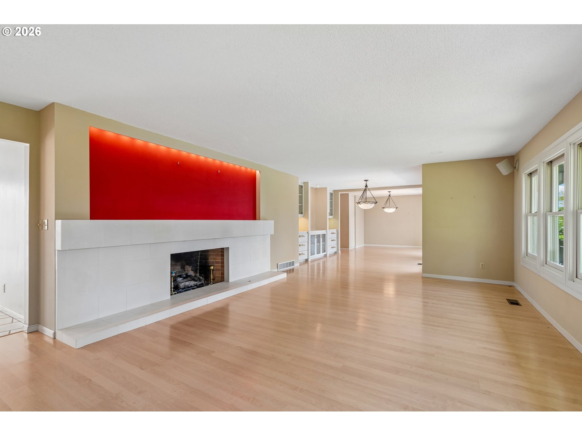 7600 Southwest Northvale Way Portland, OR 97225 - Photo 7 of 46 a view of an empty room with a window and fire place