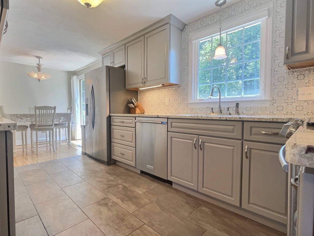 30 Edward Road Townsend, MA 01469 - Photo 14 of 42 a kitchen with a sink window and cabinets