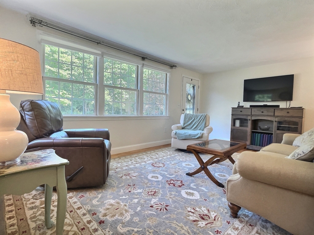 30 Edward Road Townsend, MA 01469 - Photo 16 of 42 a living room with furniture and a flat screen tv