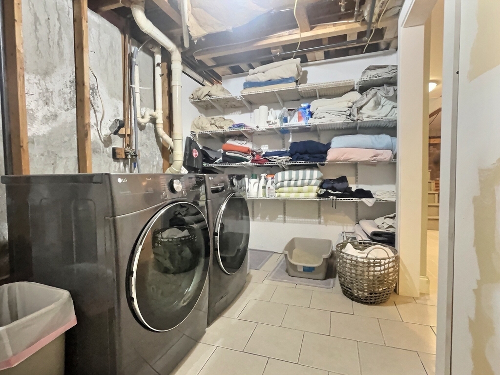30 Edward Road Townsend, MA 01469 - Photo 21 of 42 a close view of water heater room with washer and dryer
