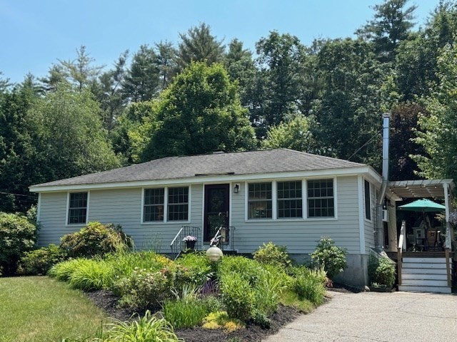 30 Edward Road Townsend, MA 01469 - Photo 23 of 42 a view of a house with a yard