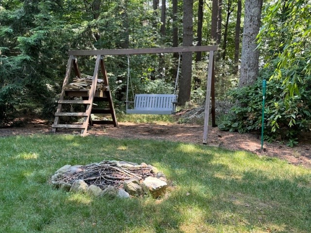 30 Edward Road Townsend, MA 01469 - Photo 42 of 42 a view of a backyard with wooden stairs and a bench