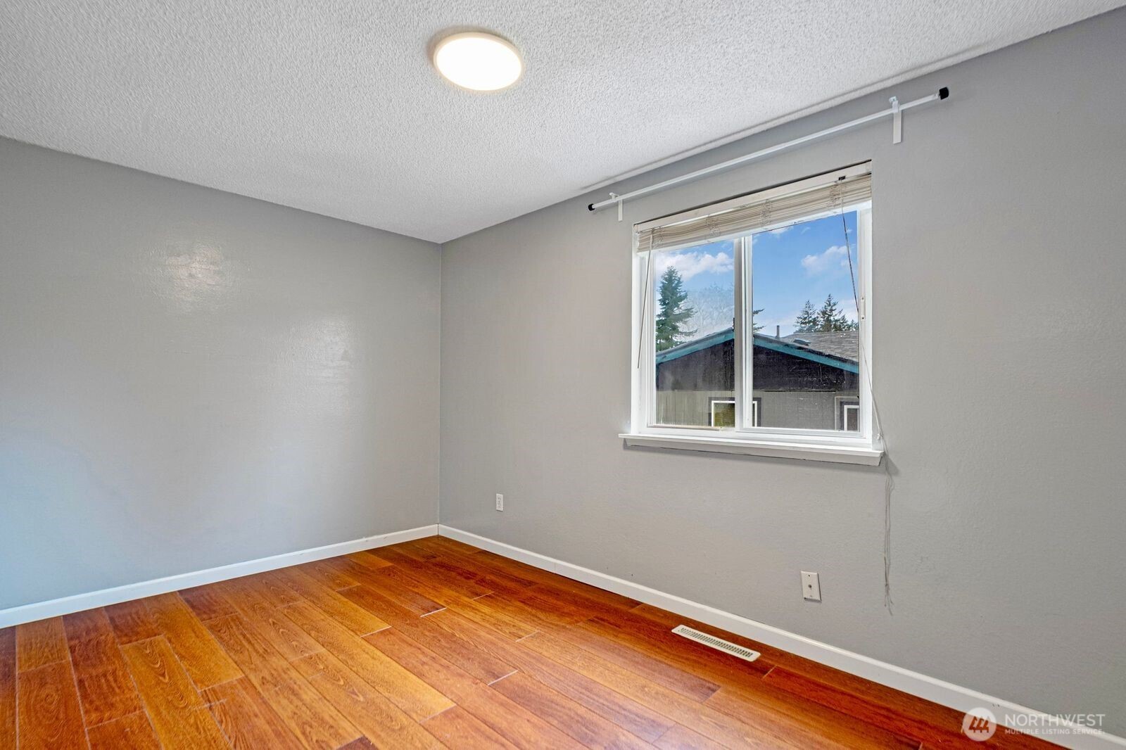 1102 156th Street East Tacoma, WA 98445 - Photo 13 of 20 a view of empty room with window