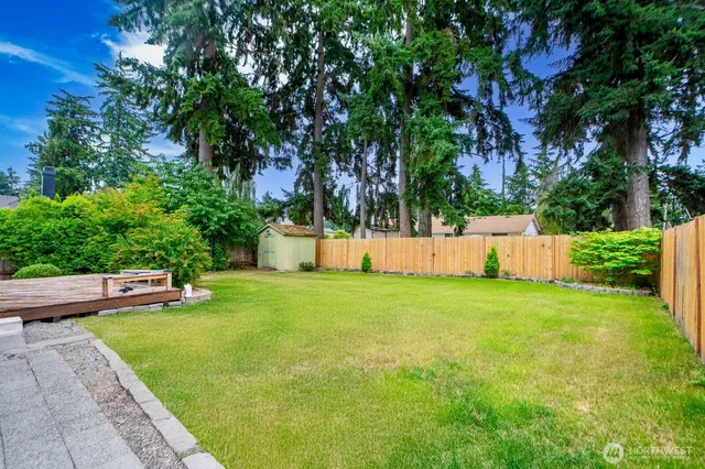a view of a backyard with a garden