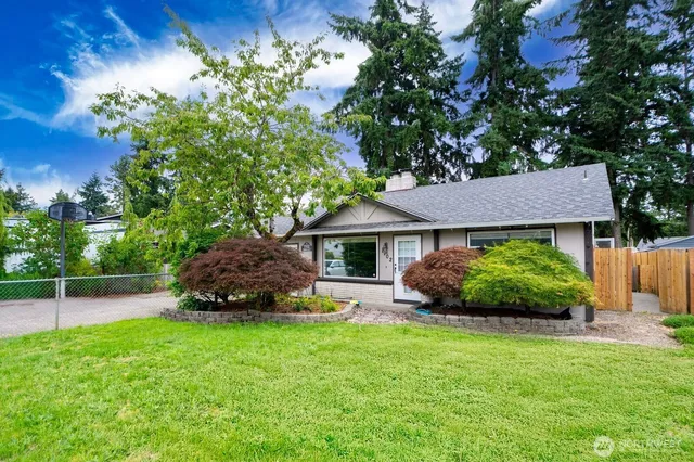 a view of a house with a garden