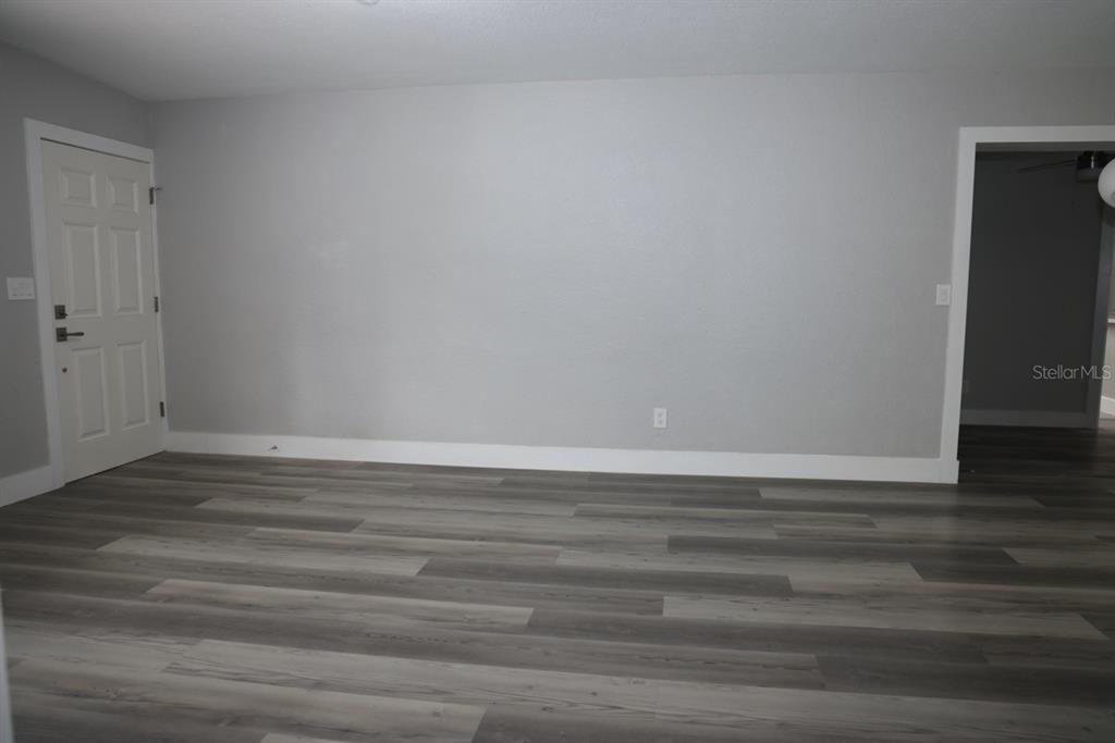 179 Alder Court Altamonte Springs, FL 32714 - Photo 9 of 77 a view of a room with wooden floor