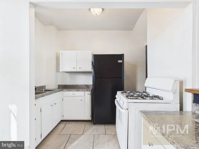 a view of kitchen island with stove