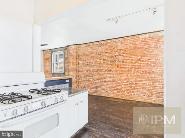 a bathroom with a sink and toilet
